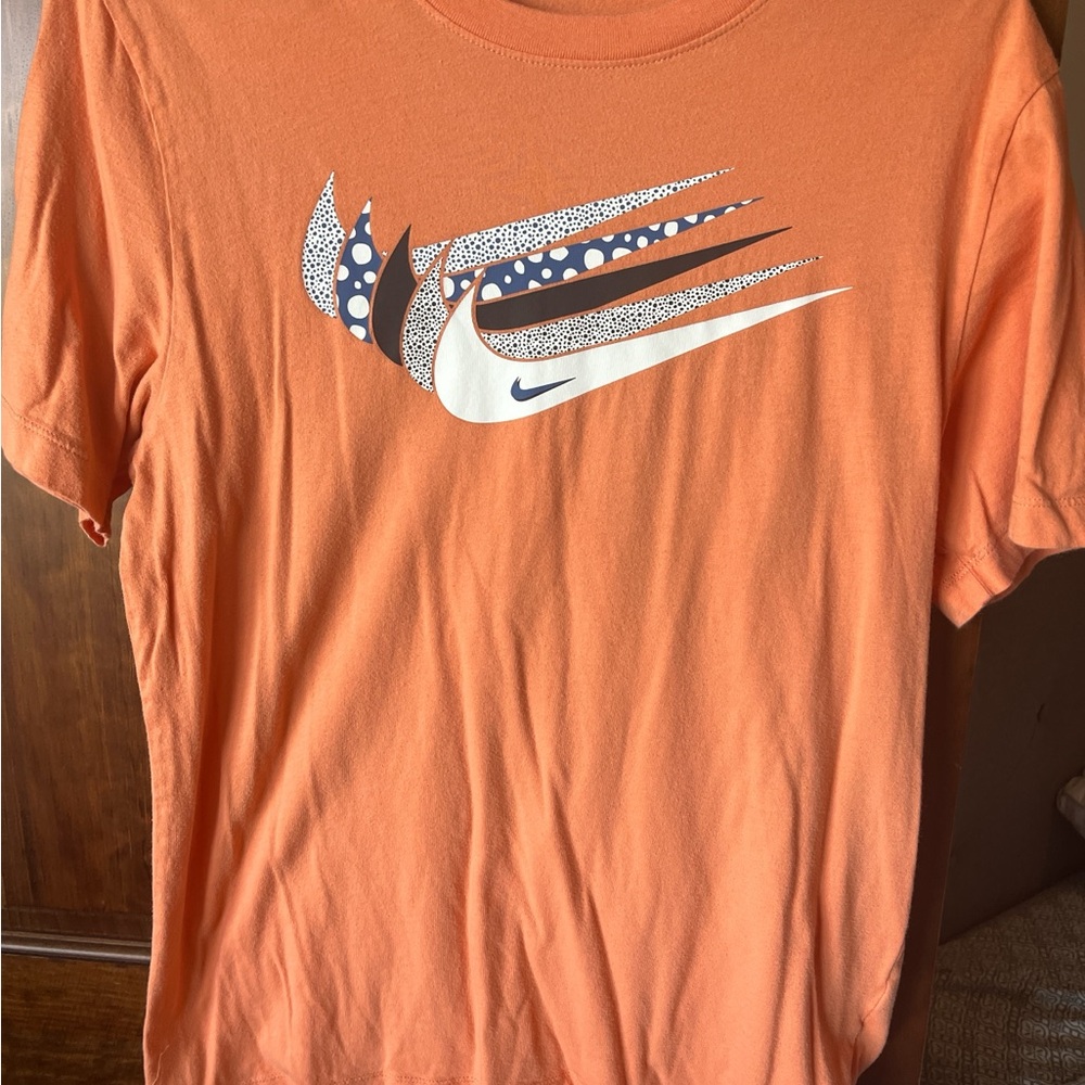 Nike Women’s Orange and White Graphic Tee